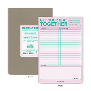 Get Your Shit Together Notepad - Front and Back view.
Back View - Information Sticker on cardboard backing Reading "Classic Pad" on top of sticker and "Same shit, different day?
Problem solved. With this pad you can easily track that shit, tackle that shit, and tame that shit. You'll discover that when you get your shit together, you can really get a lot of shit done." in the middle of the sticker