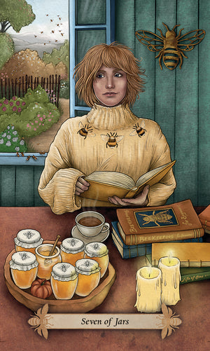 Bee Tarot sample card - "seven of jars" picture of girl reading bee keeper books at table, with seven jars of honey on table.