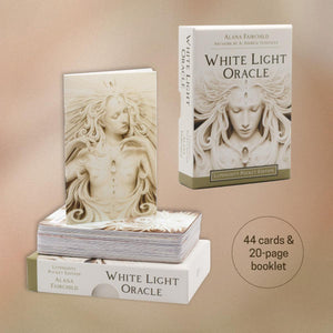 White Light Oracle card set with packaging on a beige background