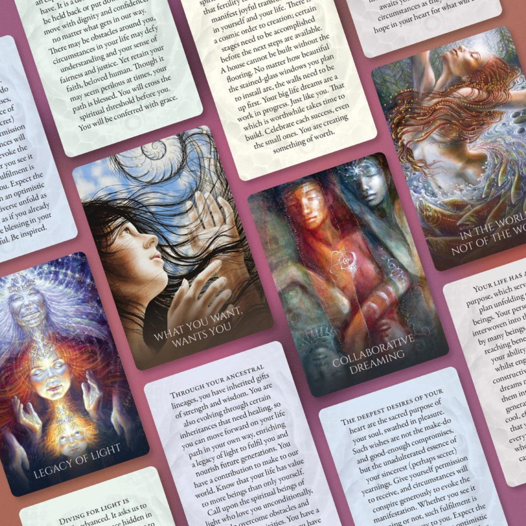 pocket edition of Sacred Rebels Oracle card deck on a dark fabric background