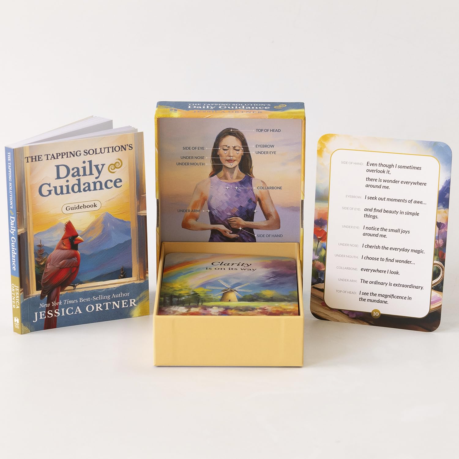 Card deck and guidebook titled 'Daily Guidance' by Jessica Ortner with nature-themed cards.