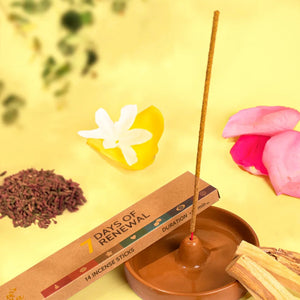 Incense stick with packaging labeled '7 Days of Renewal' on a yellow background with flowers and leaves.
