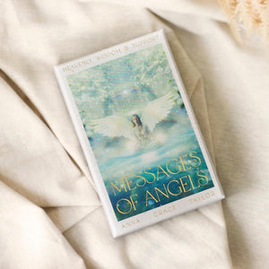 Card deck titled 'Messages of Angels' on a soft beige fabric background