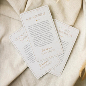 Three motivational cards on a textured beige fabric background