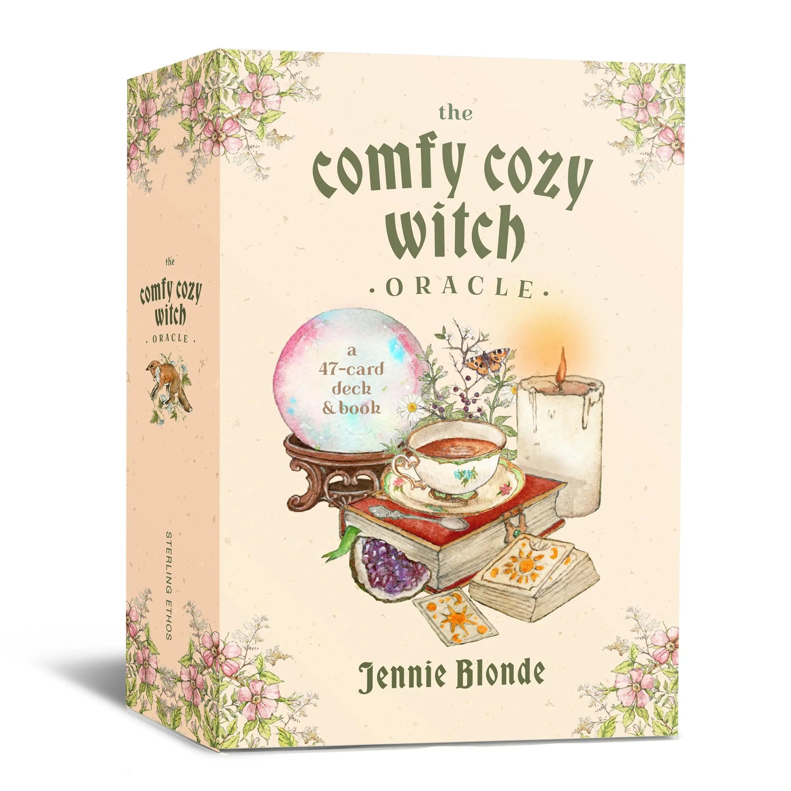 Box for 'The Comfy Cozy Witch Oracle' by Jennie Blonde with illustrations of a crystal ball, books, and tea.
