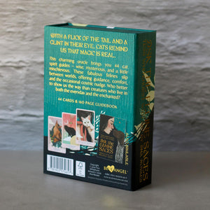 The back and spine of “Ask the Feline Sages” oracle deck box, featuring a teal and black design with gold text and illustrations of cat-themed cards.