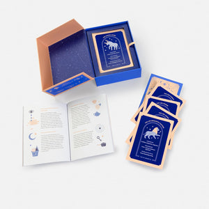 Set of tarot cards with a blue box and instructions on a white background