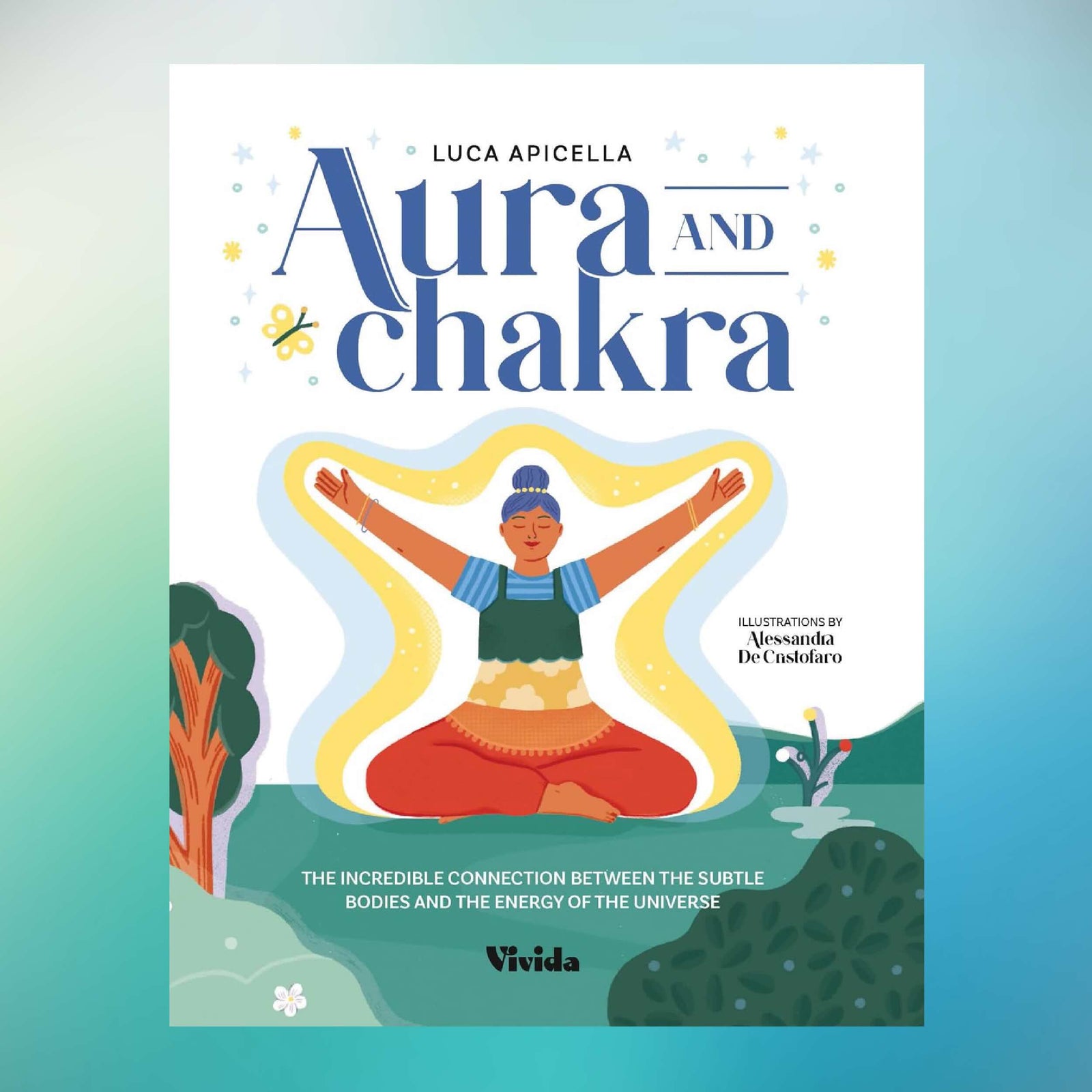 Book cover of 'Aura and Chakra' with a colorful illustration of a person in a meditative pose.