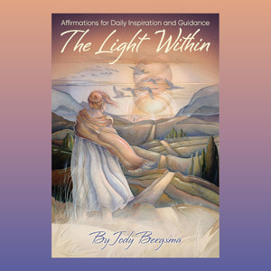 oracle deck cover of 'The Light Within' with a woman in a mountainous landscape.