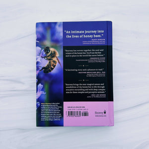 Book cover with a bee illustration on a white background