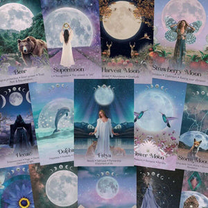 Collection of oracle cards with various designs, including moons, animals, and landscapes.