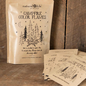 Pouch of 'Campfire Color Flames' with packaging on a wooden background