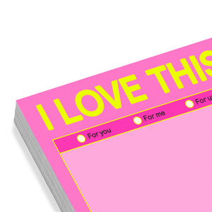 Stack of pink cards with yellow text 'I LOVE THIS' on a white background