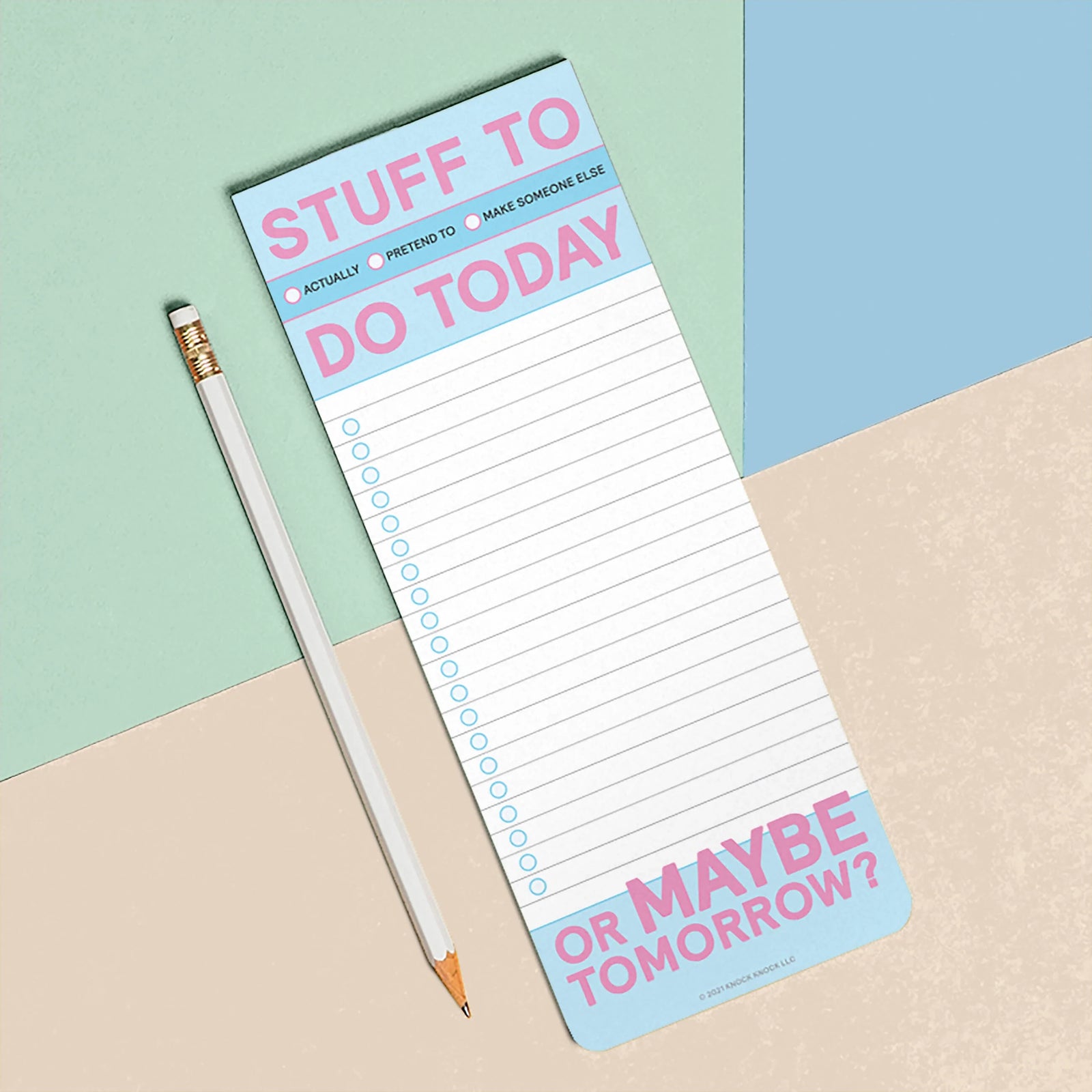 Notepad with 'Stuff to do today' text and a pencil on a multicolored background