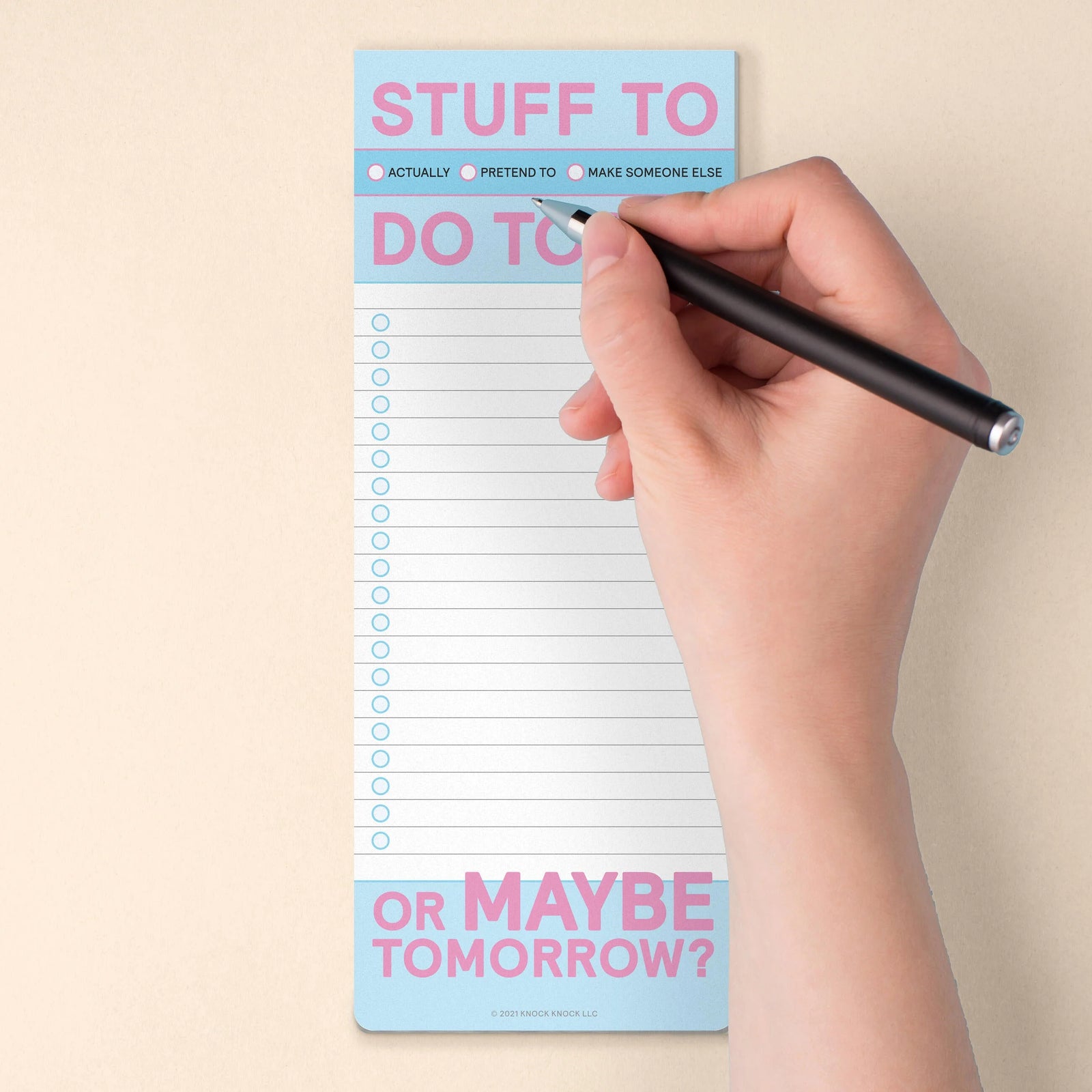 Notepad with 'Stuff to do today' text and a pencil on a multicolored background