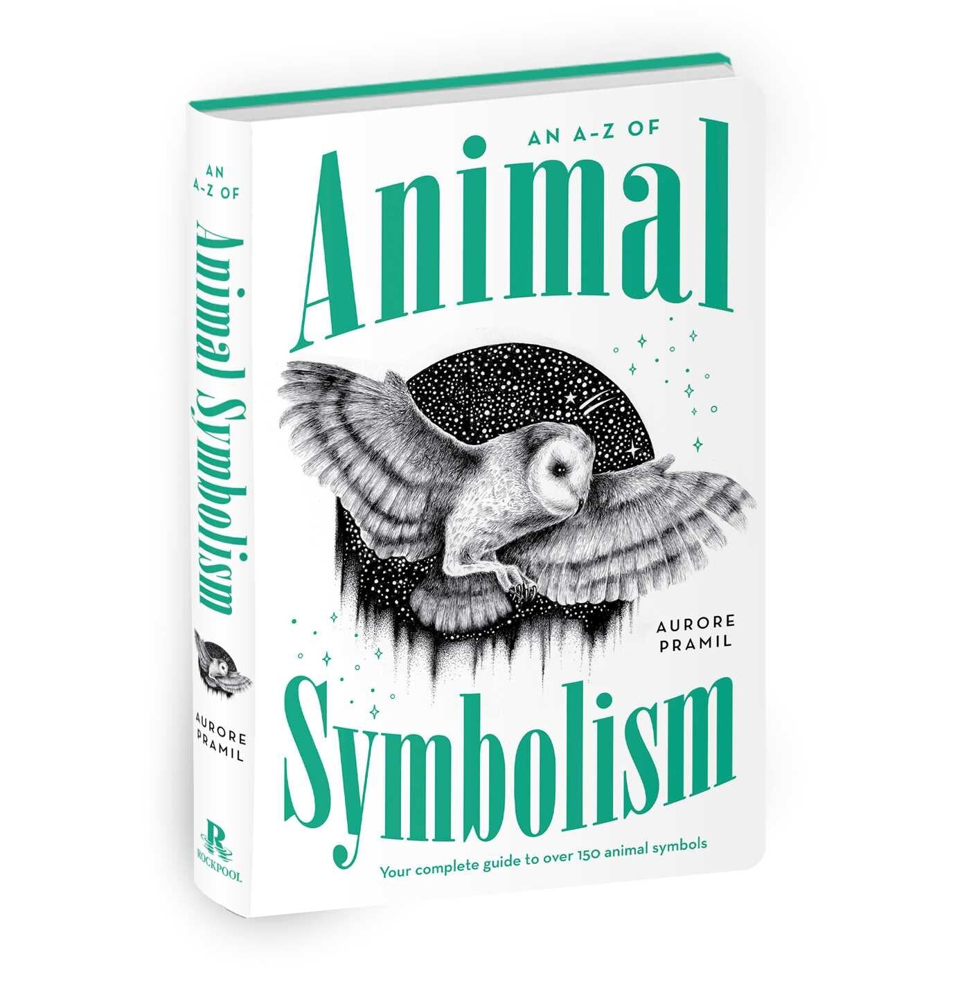 Book titled 'An A-Z of Animal Symbolism' with an owl illustration on a white background
