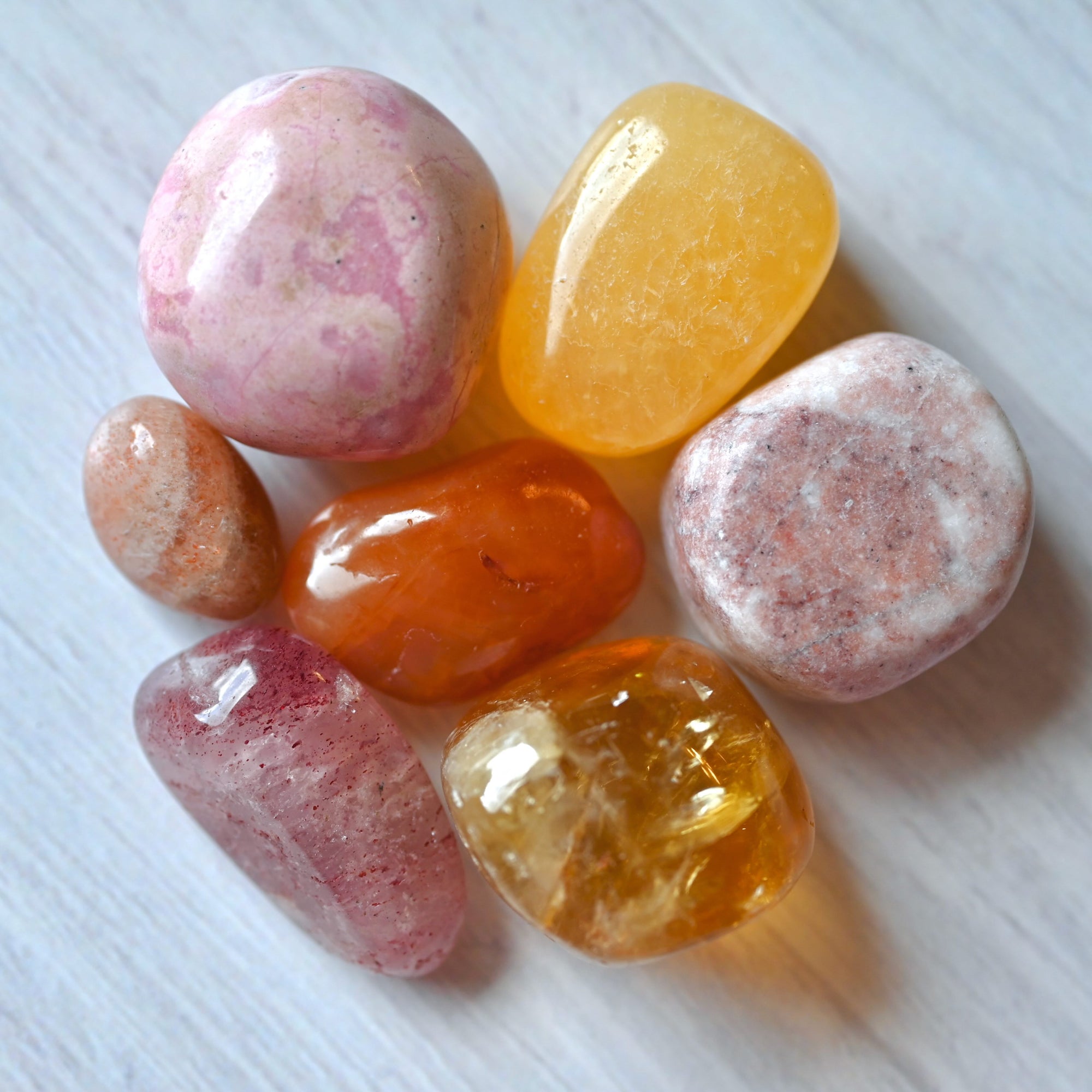 Bright orange-pink label reads 'Joy – Shine · Cheer · Uplift'. Includes Dragonfly logo.