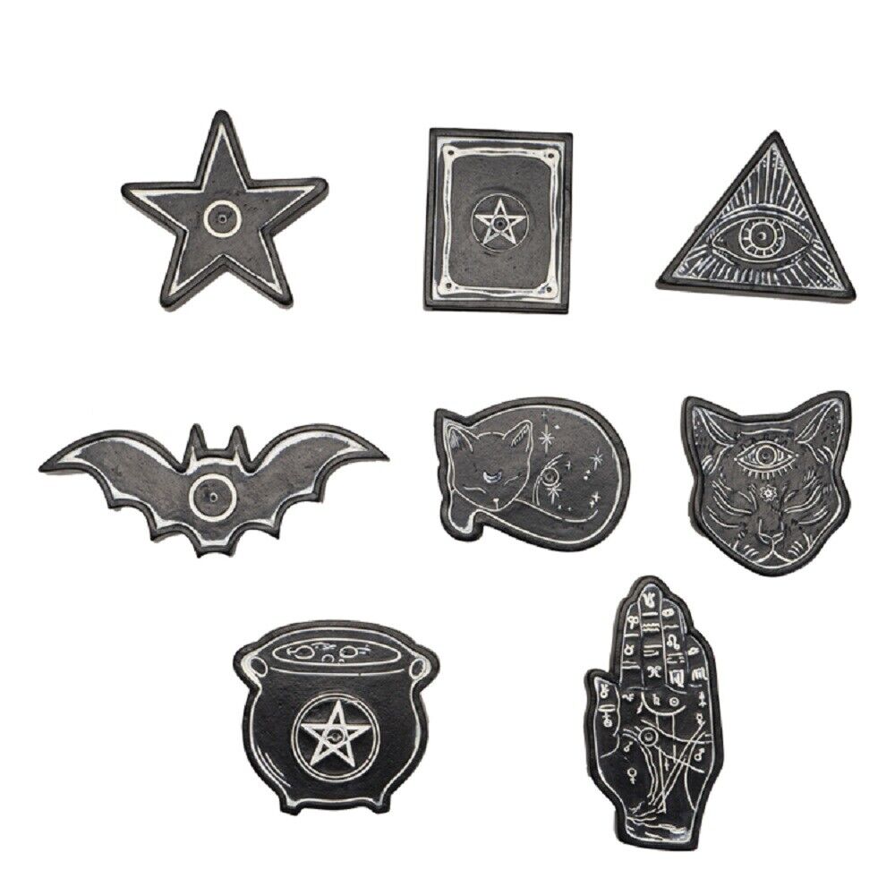 A set of eight Mystical Incense Burners with enchanting, mystical designs: a five-point star, a book with a pentagram, a triangle with an eye, a bat, a sleeping cat, a cat's head with an eye on its forehead, a cauldron with a pentagram, and a palmistry hand.