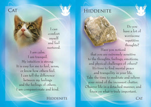 Card with a cat and crystal, featuring text about Hiddenite and its properties.