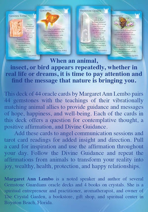 Oracle card deck with cards featuring animals, gemstones, and text on a blue background